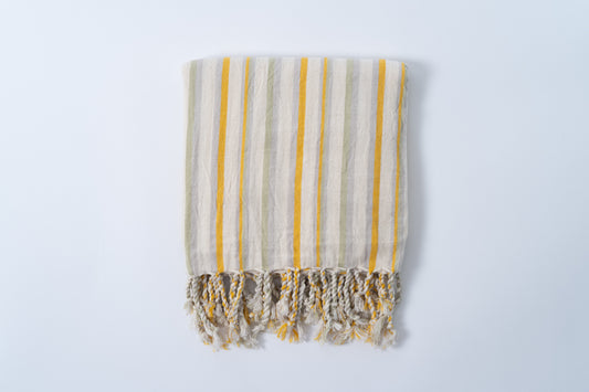 Striped towel with yellow and gray stripes on a white background