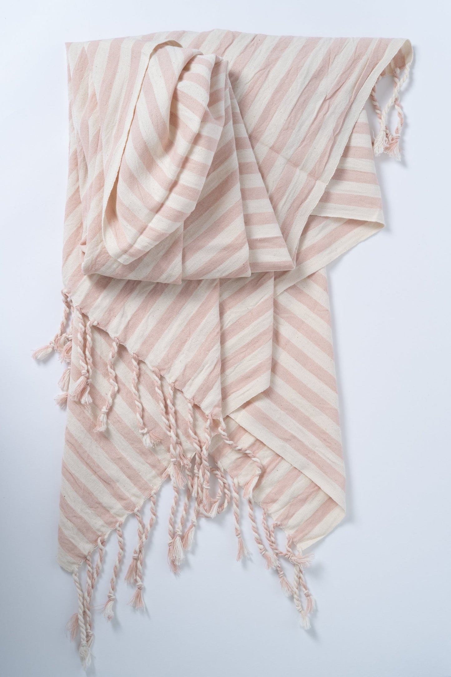 Striped scarf with tassels on a white background