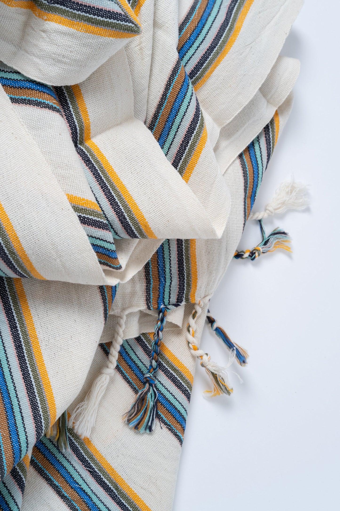 Striped fabric bundles on a white background