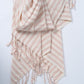 Striped scarf with tassels on a white background