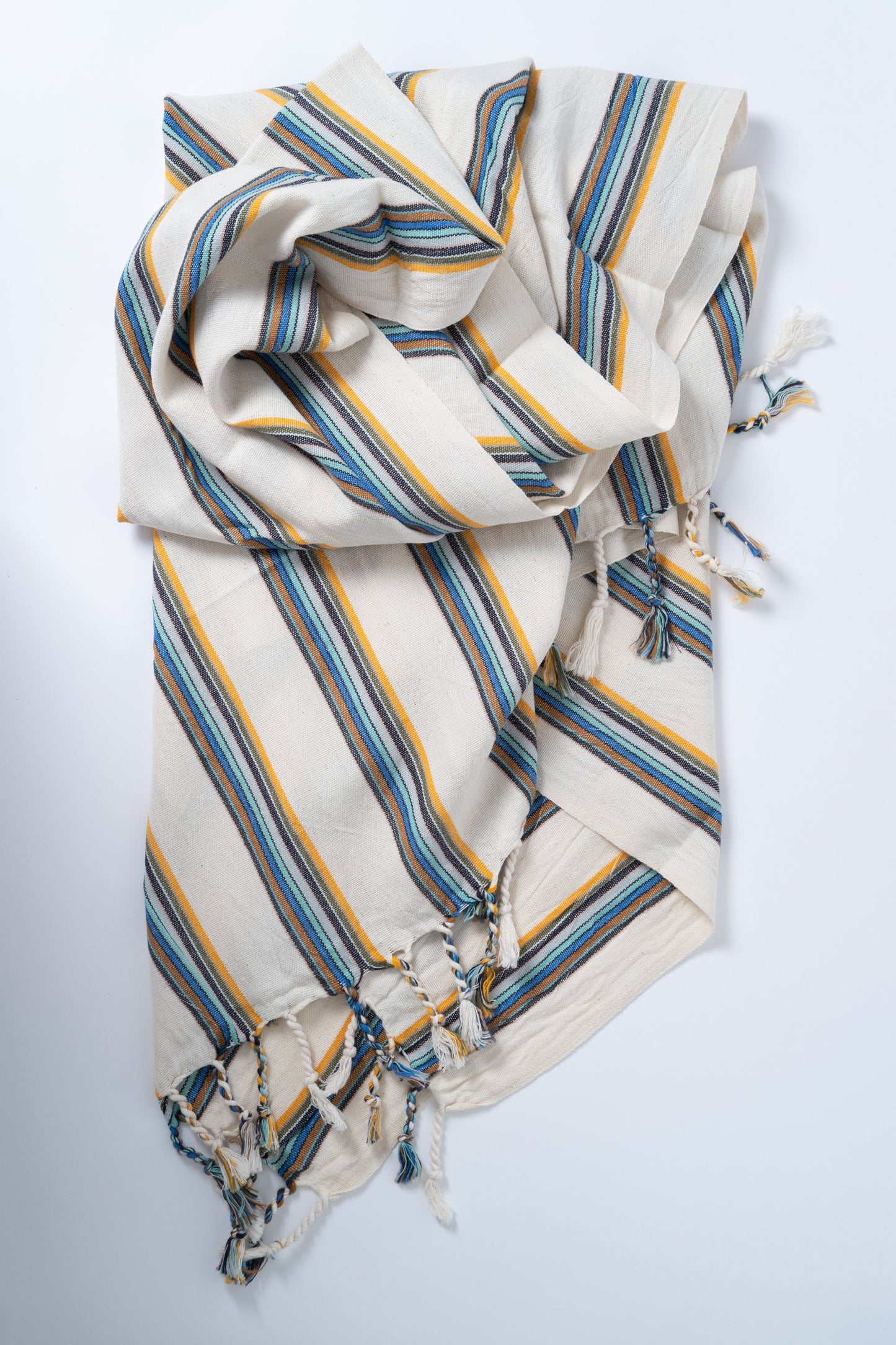 Striped fabric with blue and yellow patterns on a white background