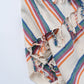 Textile with colorful striped patterns on a white background